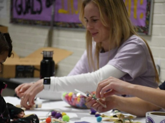 Shae Henley with one of the students at Erickson Elementary's Math and Science Night