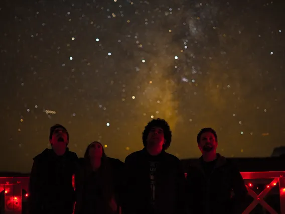 Four NAU students gaze at the Milky Way