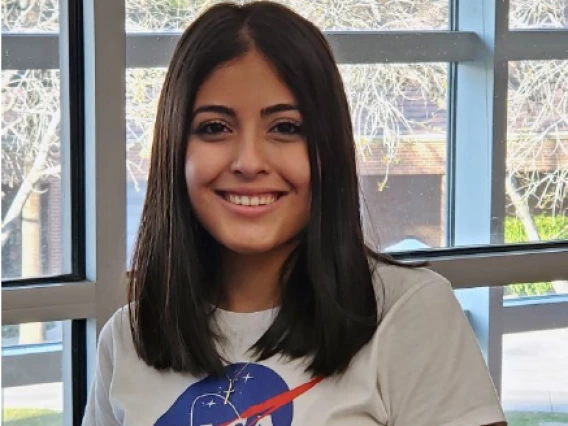 Sandra Montero in NASA shirt.