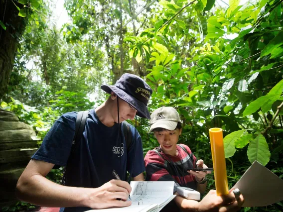 Daniel McConville and Hiroaki Sato participate in Biosphere 2 Space Camp activities.