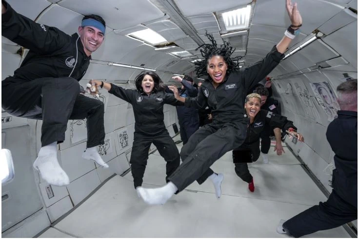 Trent Tresch (left) during the microgravity flight campaign from Kennedy Space Center. Photo credit, Trent Tresch.