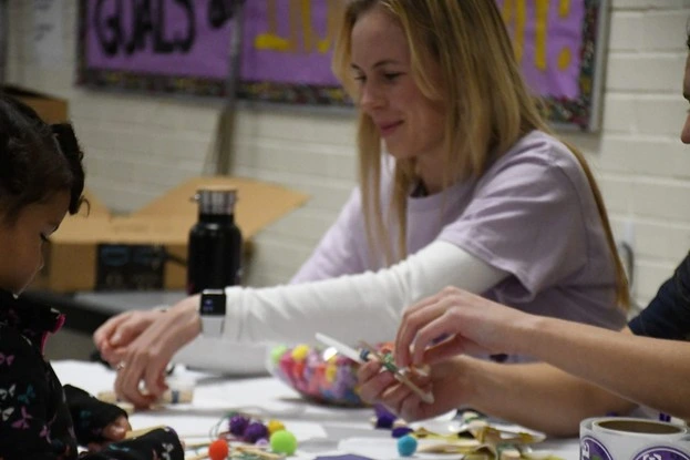 Shae Henley with one of the students at Erickson Elementary's Math and Science Night