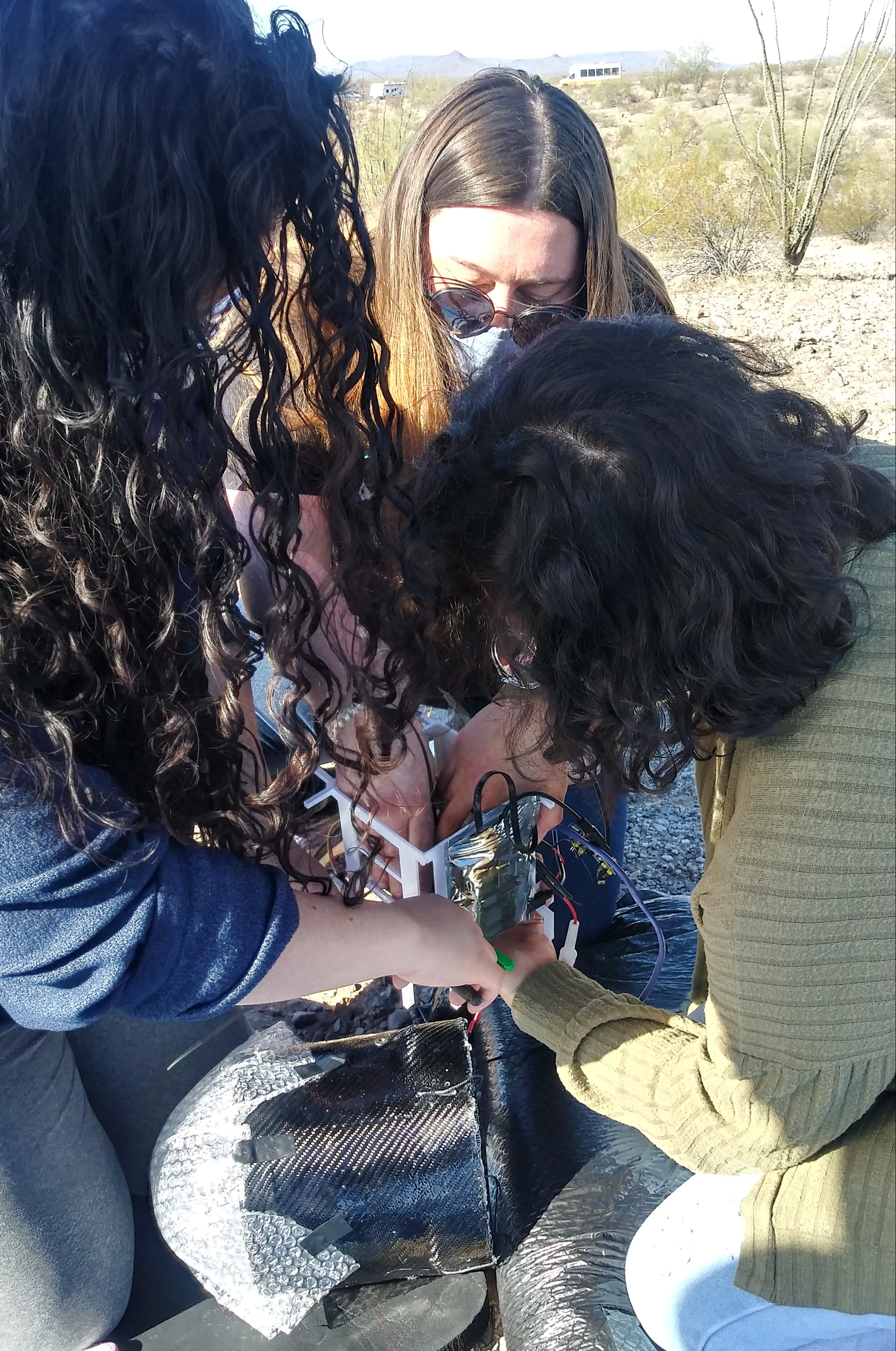 Phoenix College students working on their payload.