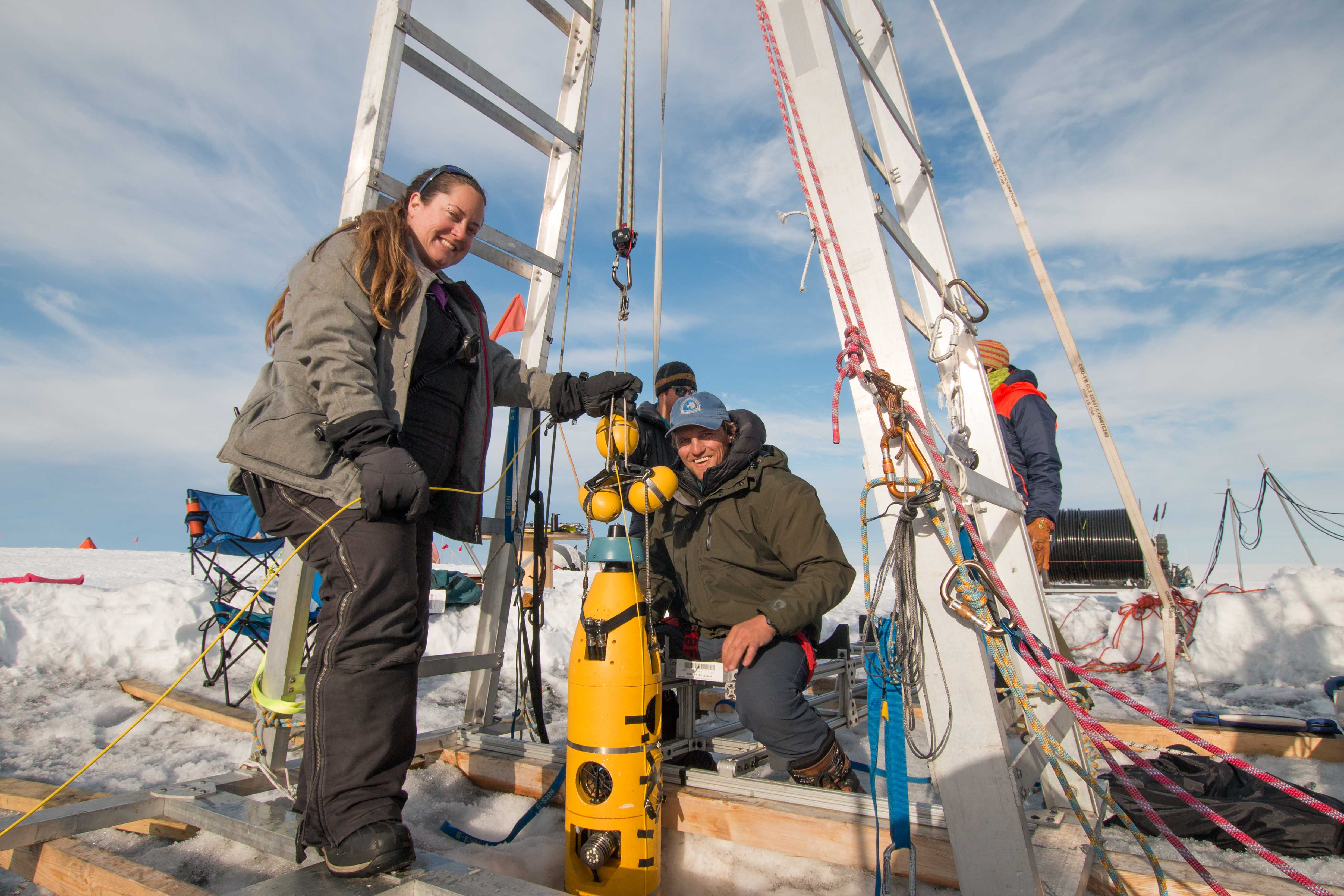 Credit: International Thwaites Glacier Collaboration / Georgia Tech-Schmidt / Dichek  ITGC researchers Britney Schmidt and Andy Mullen retrieve the robotic submarine Icefin after its last dive to the seafloor foundations of Thwaites Glacier. Icefin was engineered in Schmidt's lab at Georgia Tech.